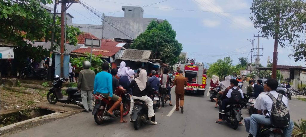 kebakaran pasar madang